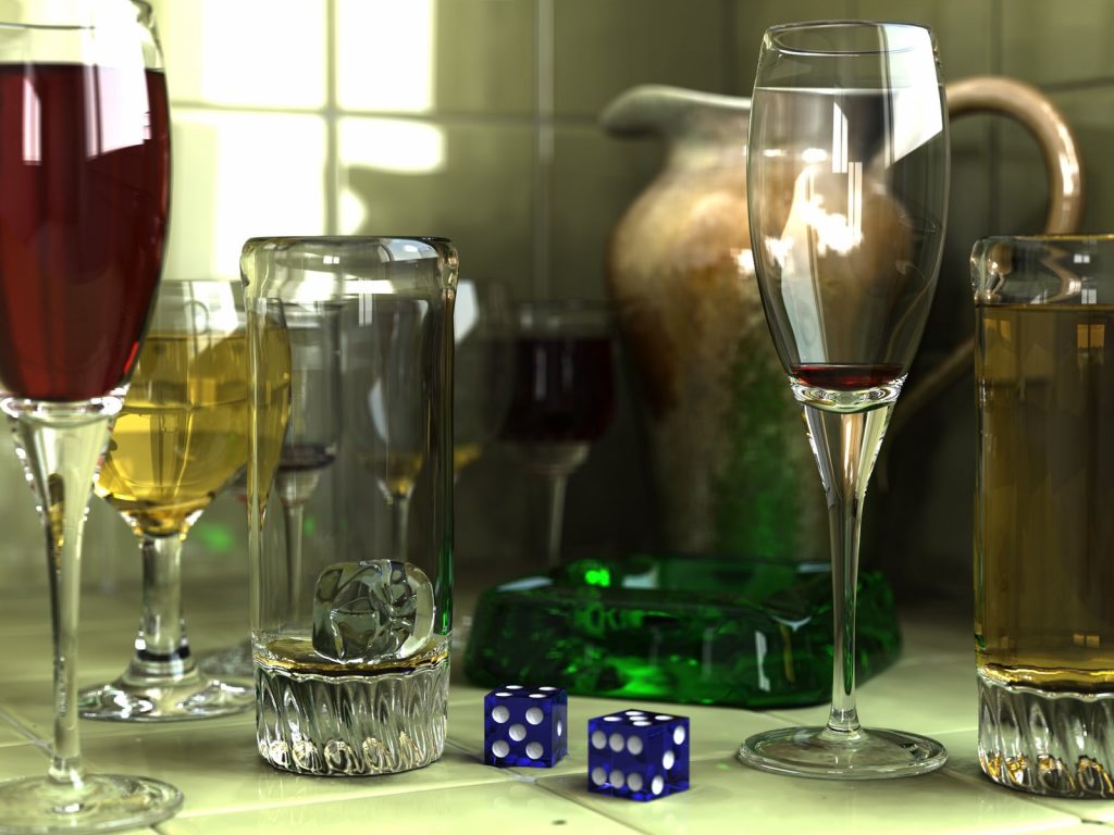 Offline ray-traced POV-Ray render of glasses, a pitcher and dice with realistic refraction